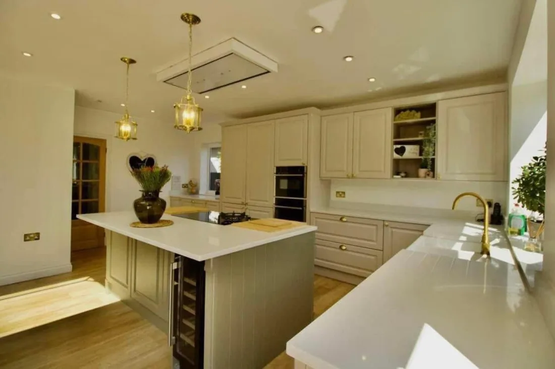Bespoke shaker kitchen with island and brass fittings