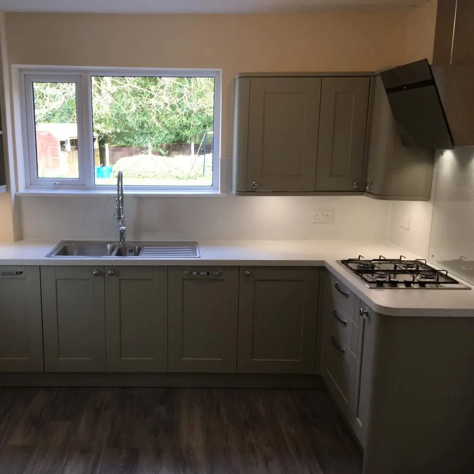 Sage green shaker kitchen installation